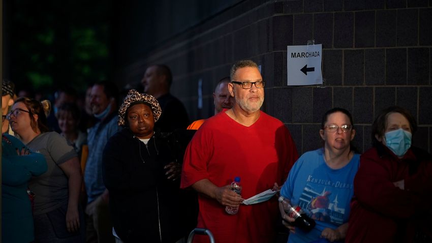 Hundreds of people line up outside the Kentucky Career Center, over two hours prior to its opening, to find assistance with their unemployment claims in Frankfort, Kentucky, U.S. June 18, 2020. REUTERS/Bryan Woolston