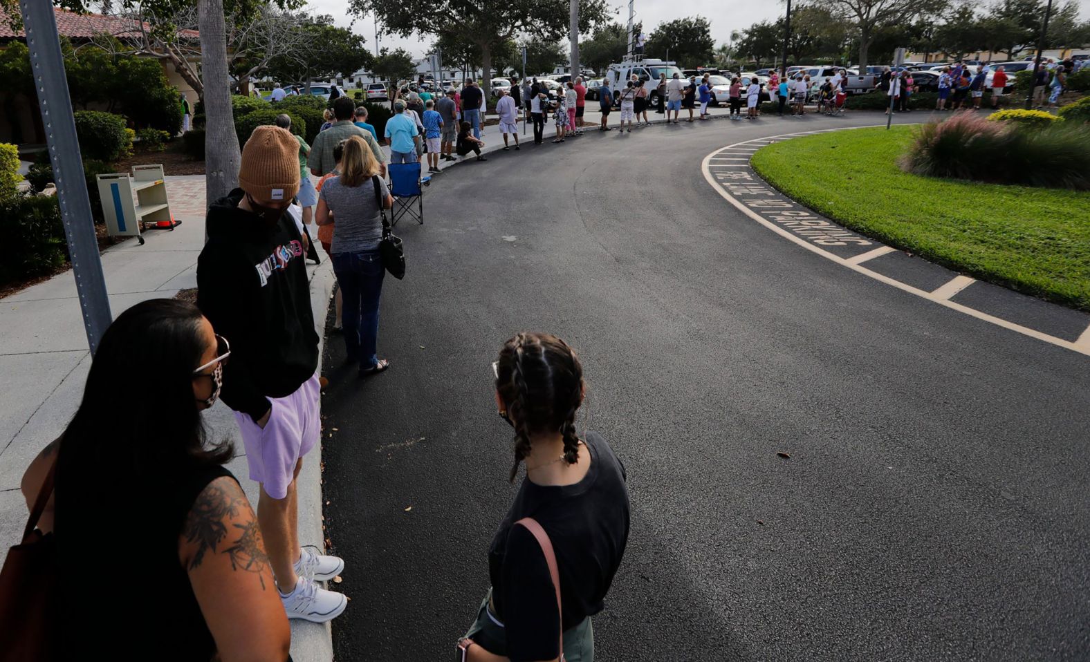 Long lines awaited residents as early in-person voting started Monday in Cape Coral. The Cape Coral library is one of several locations where registered voters can participate. It will be open from 10am- 5pm.Fnp 101920 Rr Early Voting Cc003