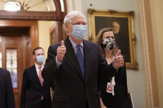 Senate Majority Leader Mitch McConnell leaves the chamber after the final vote to confirm Barrett on October 26.