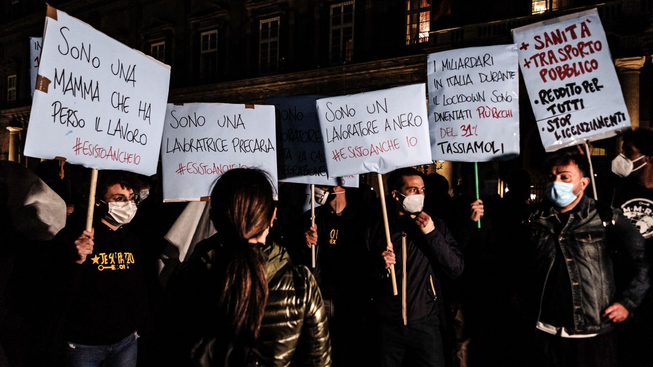 Protesters at the Piazza Plebiscito demonstrated against Covid-19 restrictions in Naples on Monday.
