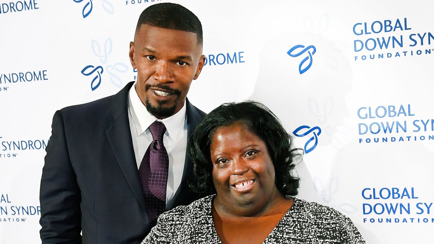 Jamie Foxx poses on the red carpet with his sister, DeOndra Dixon, at the Global Down Syndrome Foundation's 2016 'Be Beautiful, Be Yourself' fashion show.