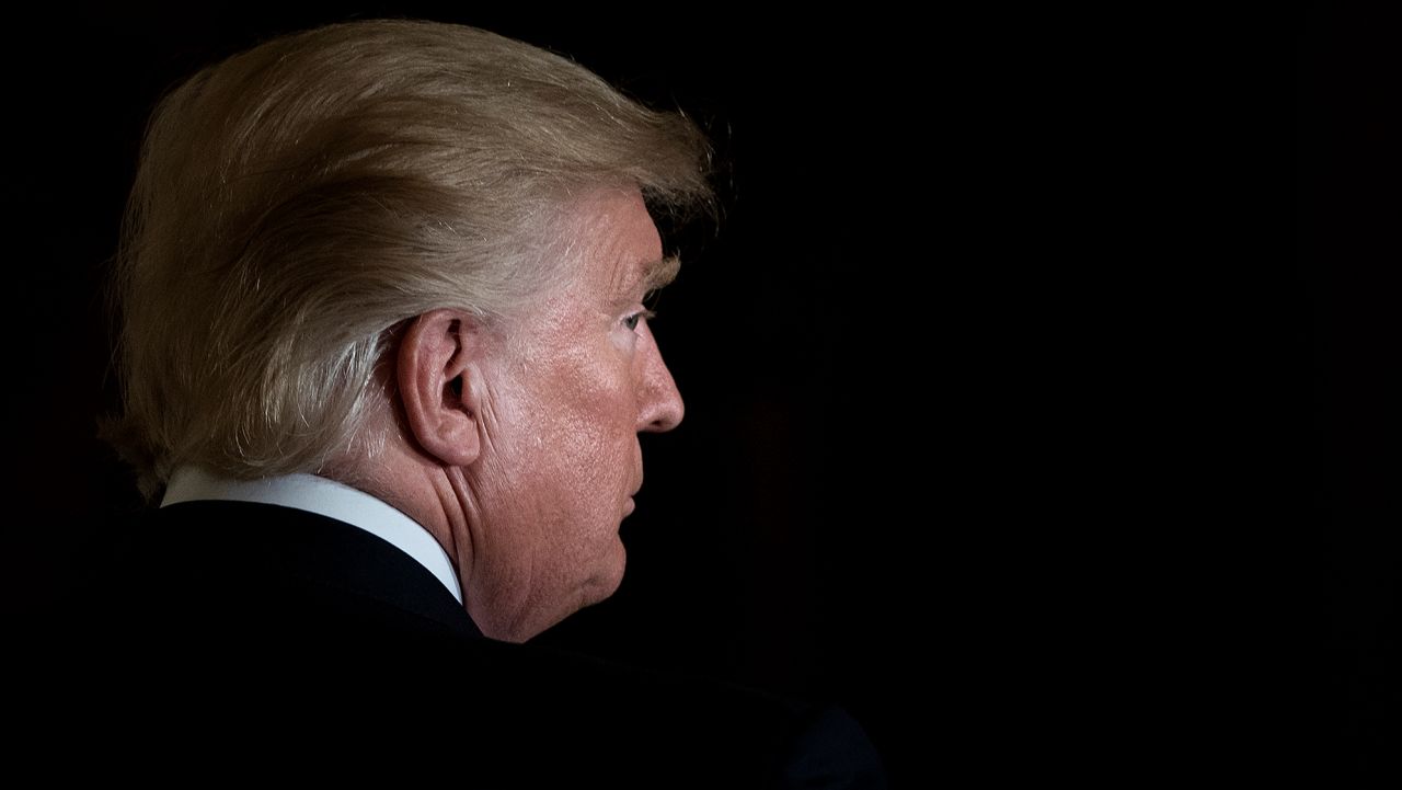 TOPSHOT - US President Donald Trump leaves after a Hispanic Heritage Month event in the East Room of the White House October 6, 2017 in Washington, DC.
President Trump invited over 200 Hispanic business, community, and faith leaders, and guests from across the country to join in the celebration of Hispanic Heritage Month. (Photo by Brendan Smialowski/AFP/Getty Images)