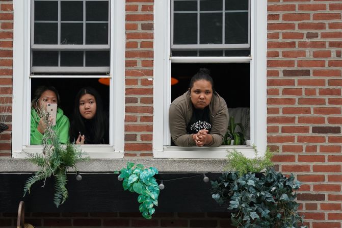 Women watch Biden speak in Chester on October 26.