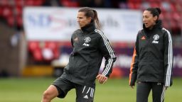 Tobin Heath and Christen Press of Manchester United warm up prior to a Barclays FA Women's Super League match (Photo by Kate McShane/Getty Images)