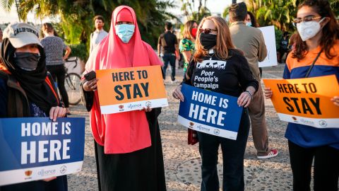 Demontrators hold signs in support of the Supreme Court's ruling in favor of the Deferred Action for Childhood Arrivals program in San Diego, California, on June 18.