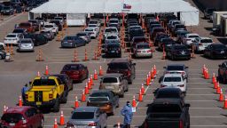 Cars line up for Covid-19 tests at the University of Texas El Paso on October 23, 2020 in El Paso, Texas. - The city has seen a surge in cases, reporting over 1,150 new cases on October 22. (Photo by Paul Ratje / AFP) (Photo by PAUL RATJE/AFP via Getty Images)