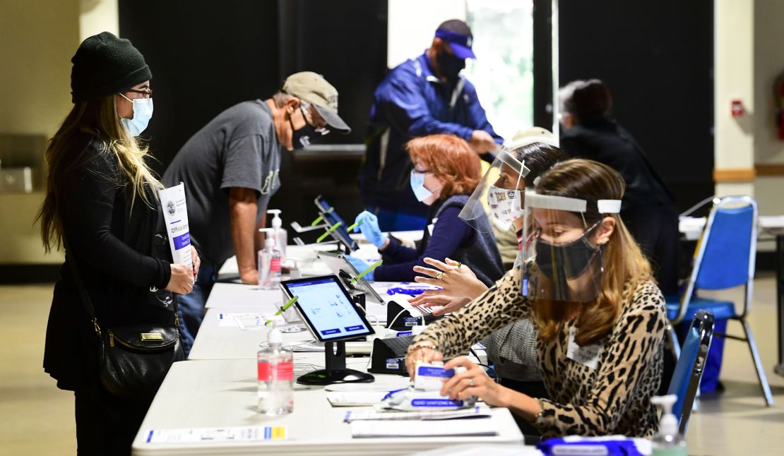 Voters check in with election officials in Arcadia, California, on October 26.