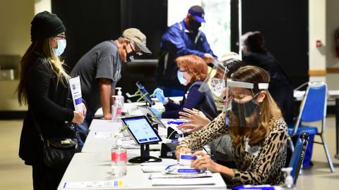 Voters check in with election officials in Arcadia, California, on October 26.