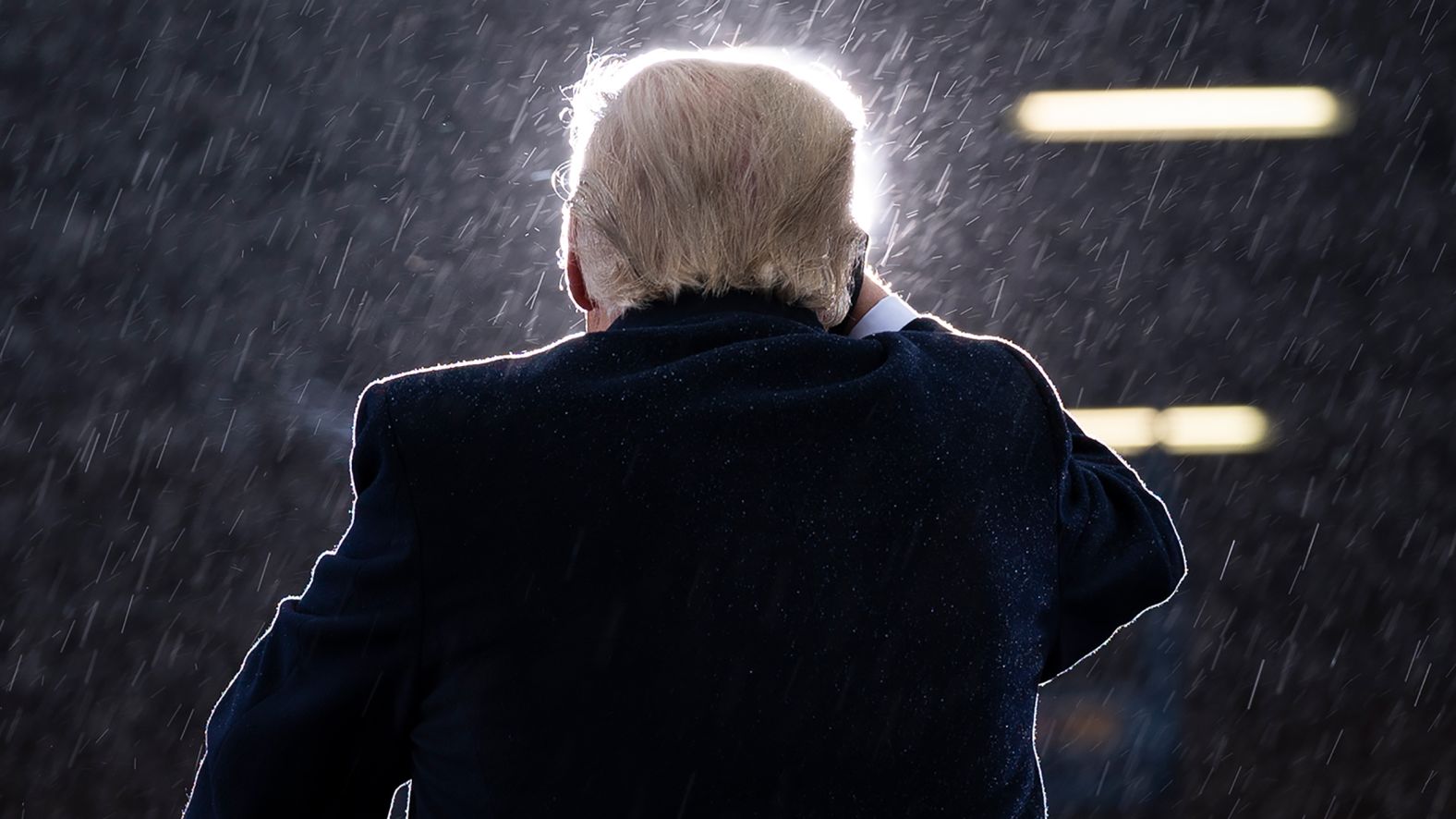 Trump speaks during a campaign rally at an airport in Lansing, Michigan, on October 27.