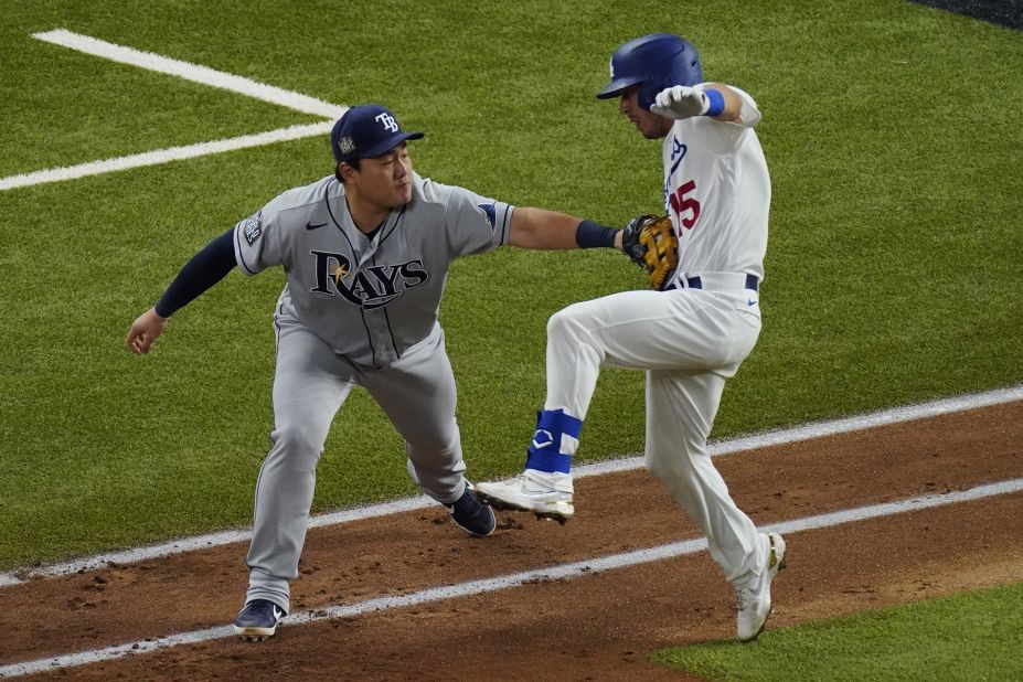 Tampa Bay Rays first baseman Ji-Man Choi tags out Los Angeles Dodgers' Austin Barnes during the third inning.
