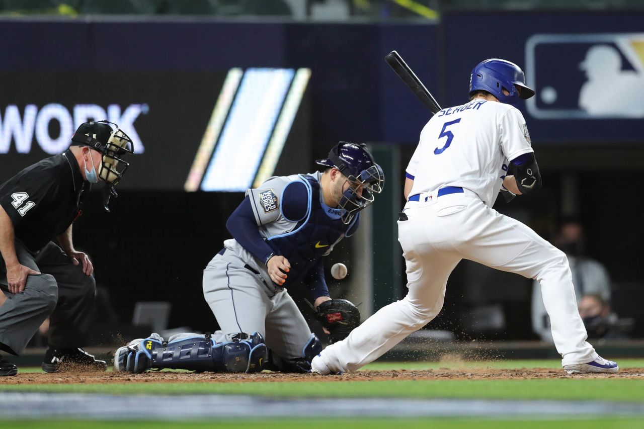 Rays' Mike Zunino chases a wild pitch by Nick Anderson in the sixth inning.