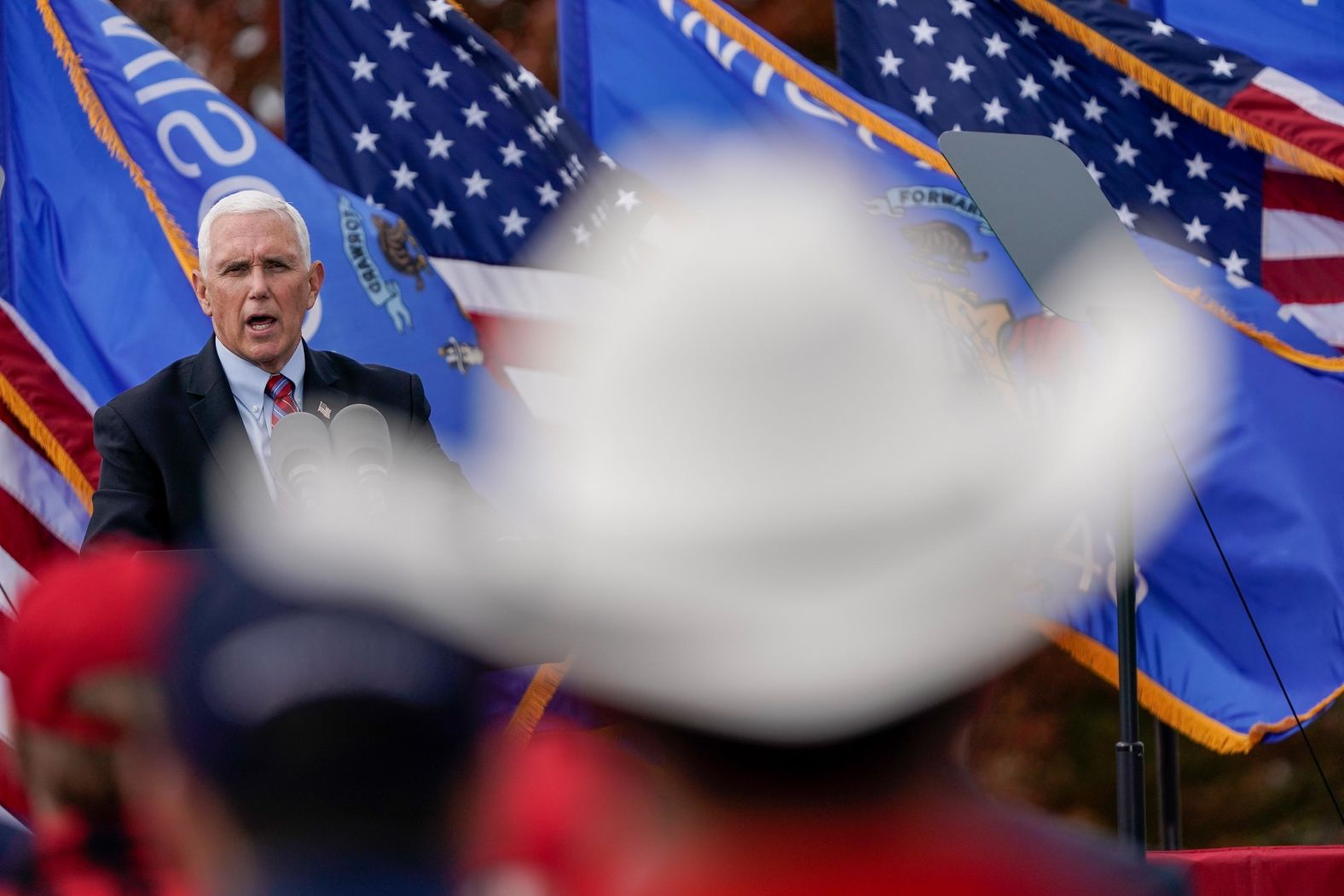 Vice President Mike Pence speaks at a campaign rally at Weldall Manufacturing on Tuesday, October 13, in Waukesha, Wisconsin.