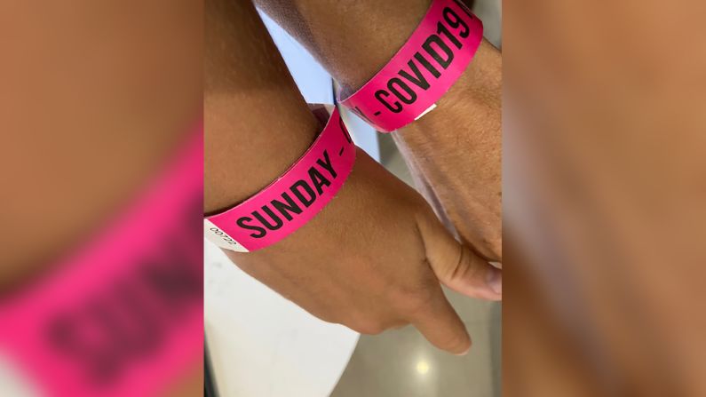 <strong>A hotel quarantine with kids: </strong>Julie Earle-Levine and her son Jack arrived in Australia and were given these bracelets to wear. Click through for more scenes featuring families traveling internationally during the pandemic. 