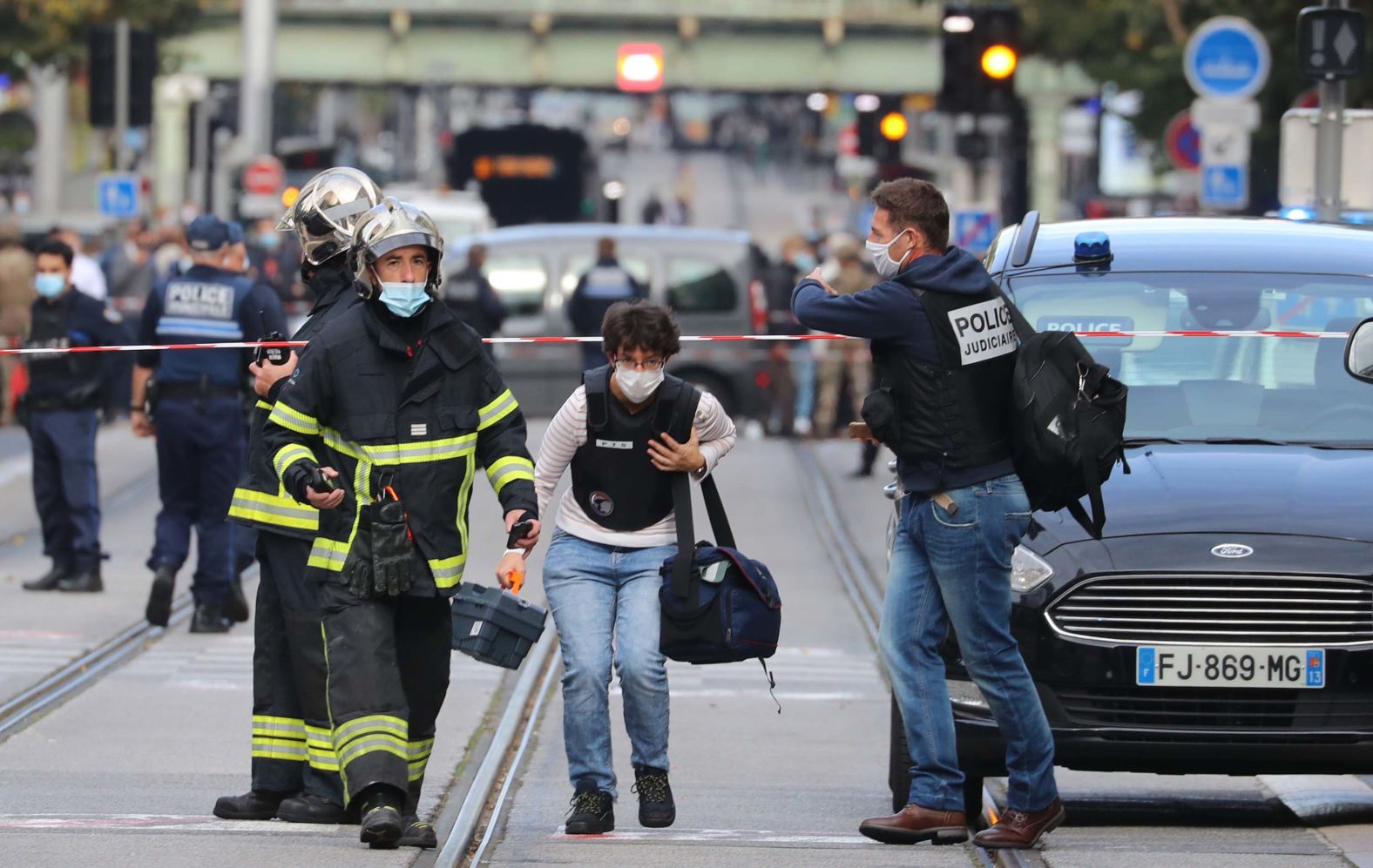 Forensics officers arrive at the site of the attack.