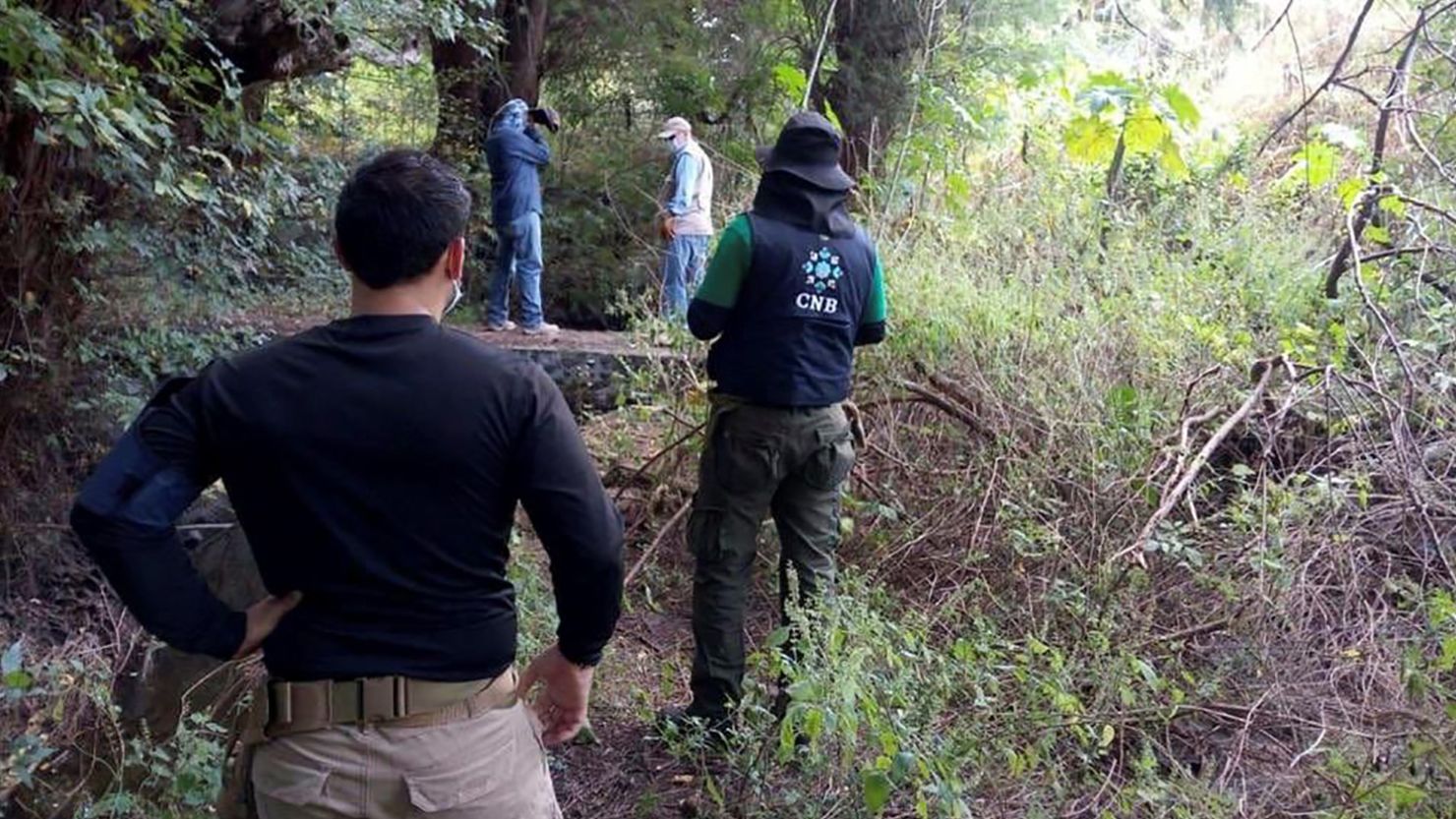 Members of Mexico's National Commission for the Search of Persons (CNBP) pictured searching a site in the town of Salvatierra.