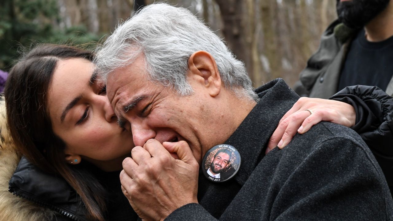 Negeen Ghaisar, left, comforts her father, James Ghaiser, after they tried to talk to someone to at the United States Park Police George Washington Memorial Parkway Station about the death of Bijan Ghaisar on Sunday, December 24, 2017.