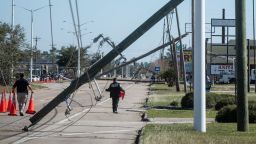 Police block off a section of U.S. Highway 90 because of fallen utility poles in Bay St. Louis, Miss. due to strong winds from Hurricane Zeta Thursday, Oct. 29, 2020.Sdw 7156