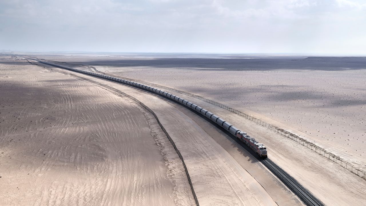 A photograph of a train running along stage one of the network, connecting gas fields to the port of Ruwais in Abu Dhabi.