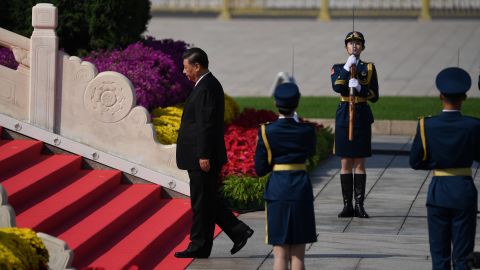 Chinese President Xi Jinping walks to the Monument to the Peoples Heroes during a wreath laying ceremony to honour deceased national heroes on Martyrs Day in Beijings Tiananmen Square on September 30.