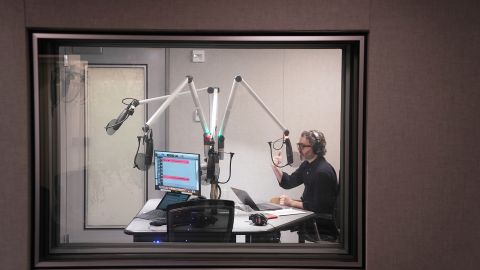 "The Daily" host Michael Barbaro in the studio (Photo by Damon Winter/The New York Times)