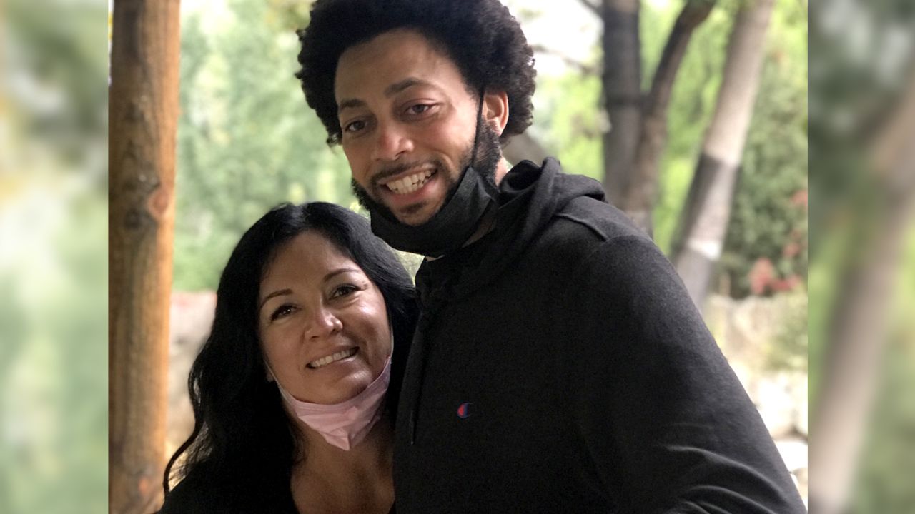 Victoria Villareal and Jeff Harper pose for a photo in their home in Idaho, United States, in October 2020.