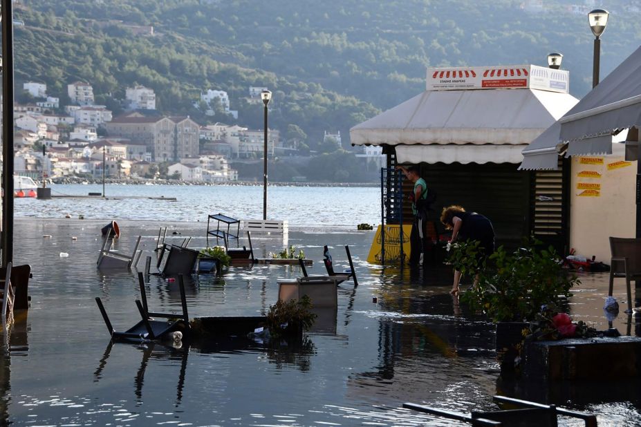 Seawater covers a square at the Vathi port in Samos.