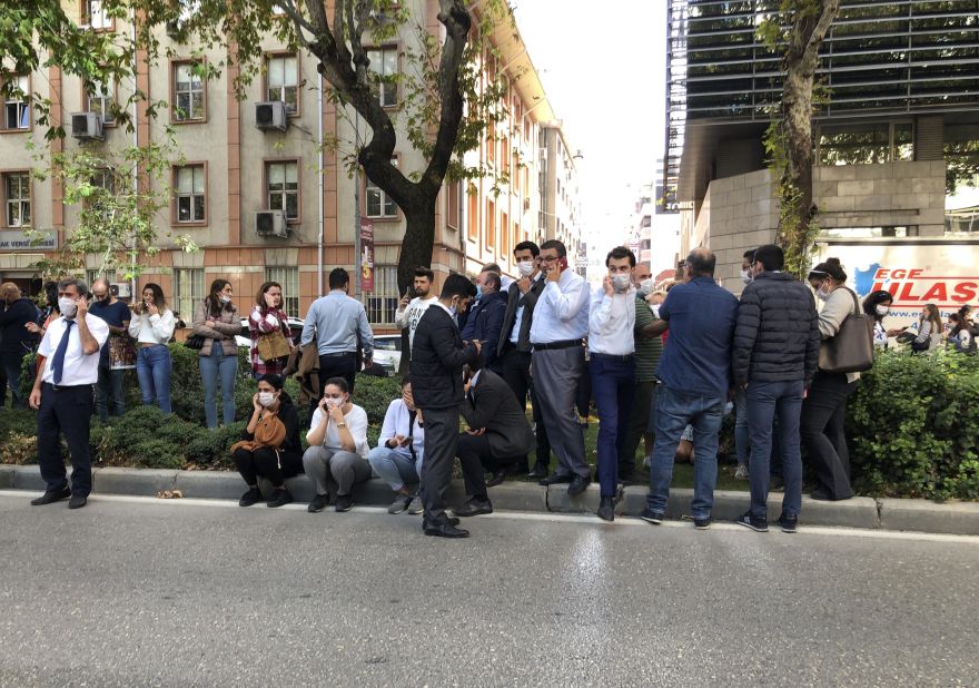 People gather in a street in Izmir.