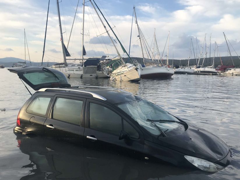 A car and boats are damaged on the coast of Izmir.