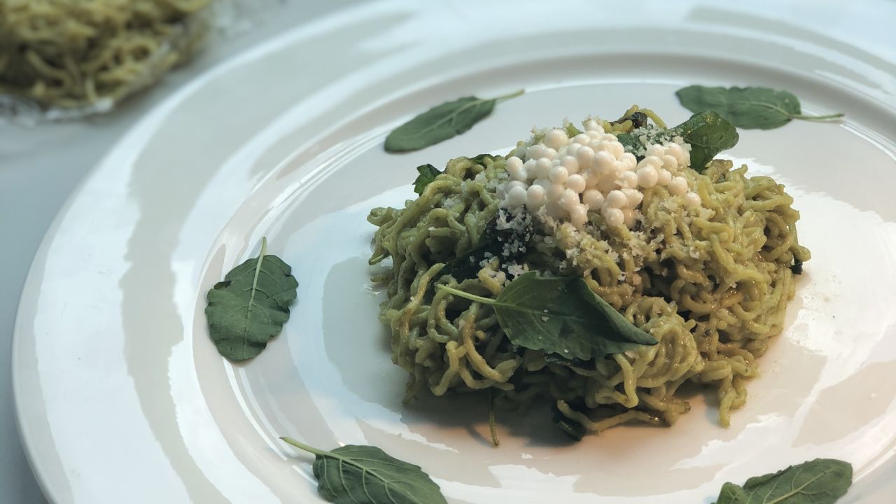While this may look like a regular pesto pasta dish, the spaghetti is actually a carb-free, keto-friendly, high-protein substitute made from chicken feathers.