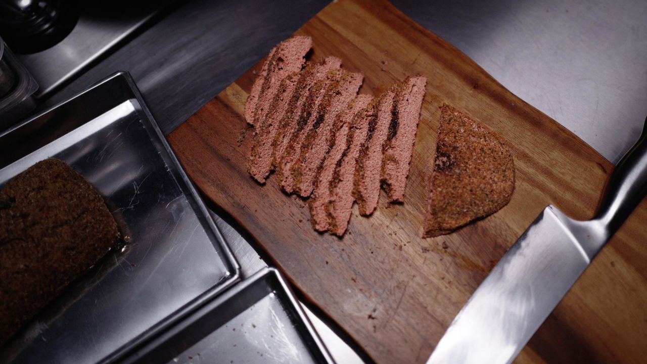 When cooked, the sliced "meat" has the look and texture of a meatloaf or burger, says Kittibanthorn. The feather protein has no taste, he says, which means it's very flexible; it relies completely on seasoning for flavor. 