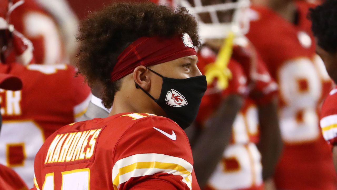 Quarterback Patrick Mahomes of the Kansas City Chiefs wears a mask on the sidelins of a game on September 10, 2020, in Kansas City, Missouri.