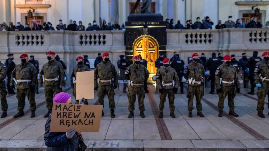 Friday's protest in Warsaw was the largest Poland has seen in decades as demonstrators wearing face masks and holding placards took to the streets.