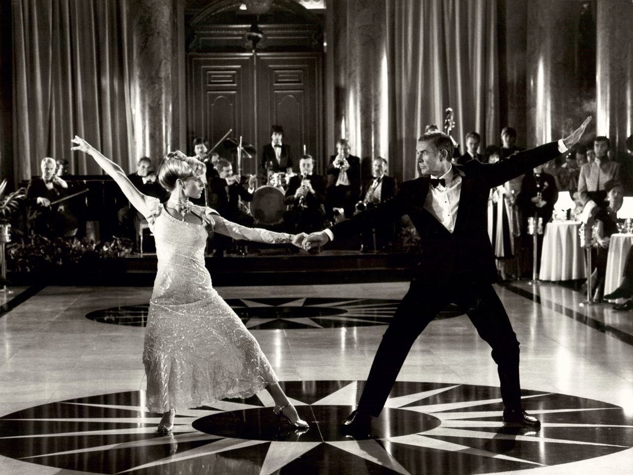Connery dances with Kim Basinger in a scene from the 1983 film "Never Say Never Again," his last film as Bond.