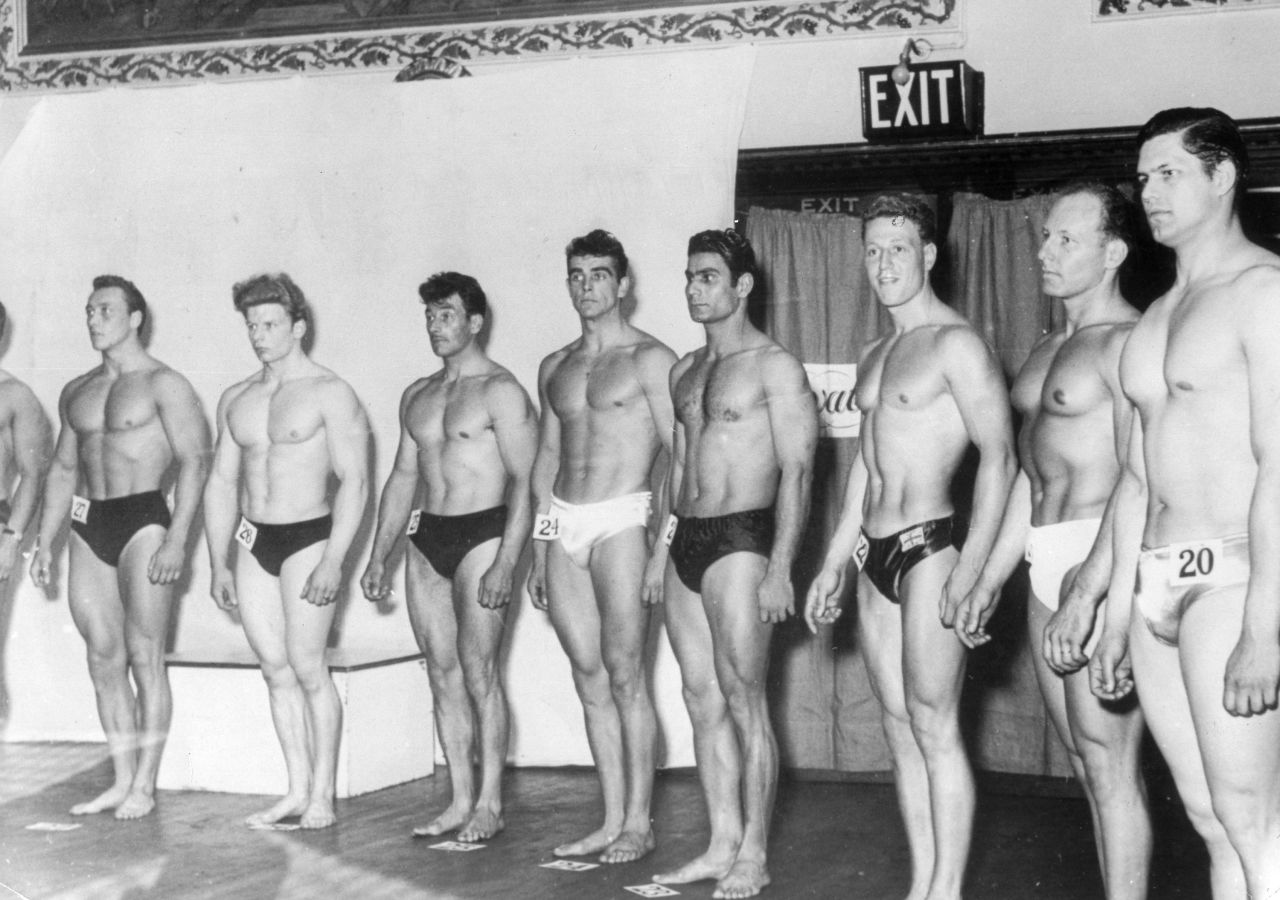Connery, number 24 in center, competes in a bodybuilder beauty contest in the 1950s.