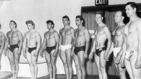 Connery, number 24 in center, competes in a bodybuilder beauty contest in the 1950s.