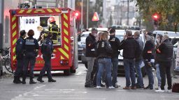 TOPSHOT - Security and emergency personnel are on October 31, 2020 in Lyon at the scene where an attacker armed with a sawn-off shotgun wounded an Orthodox priest in a shooting before fleeing, said a police source. - The priest, who has Greek nationality, was closing his church when the attack happened and is now in a serious condition, said the source, who asked not to be named. The shooting comes three days after three people were killed in a knife rampage inside a church in the southern town of Nice as France was already on edge after the republication in early September of cartoons of the prophet Mohammed by the Charlie Hebdo weekly, and the beheading of a teacheract. (Photo by PHILIPPE DESMAZES / AFP) (Photo by PHILIPPE DESMAZES/AFP via Getty Images)