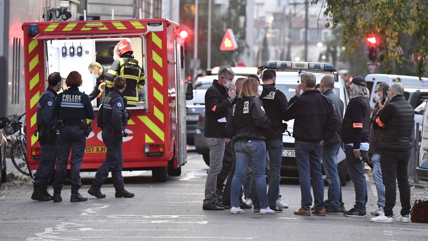 Security and emergency personnel respond to the shooting in Lyon on Saturday.