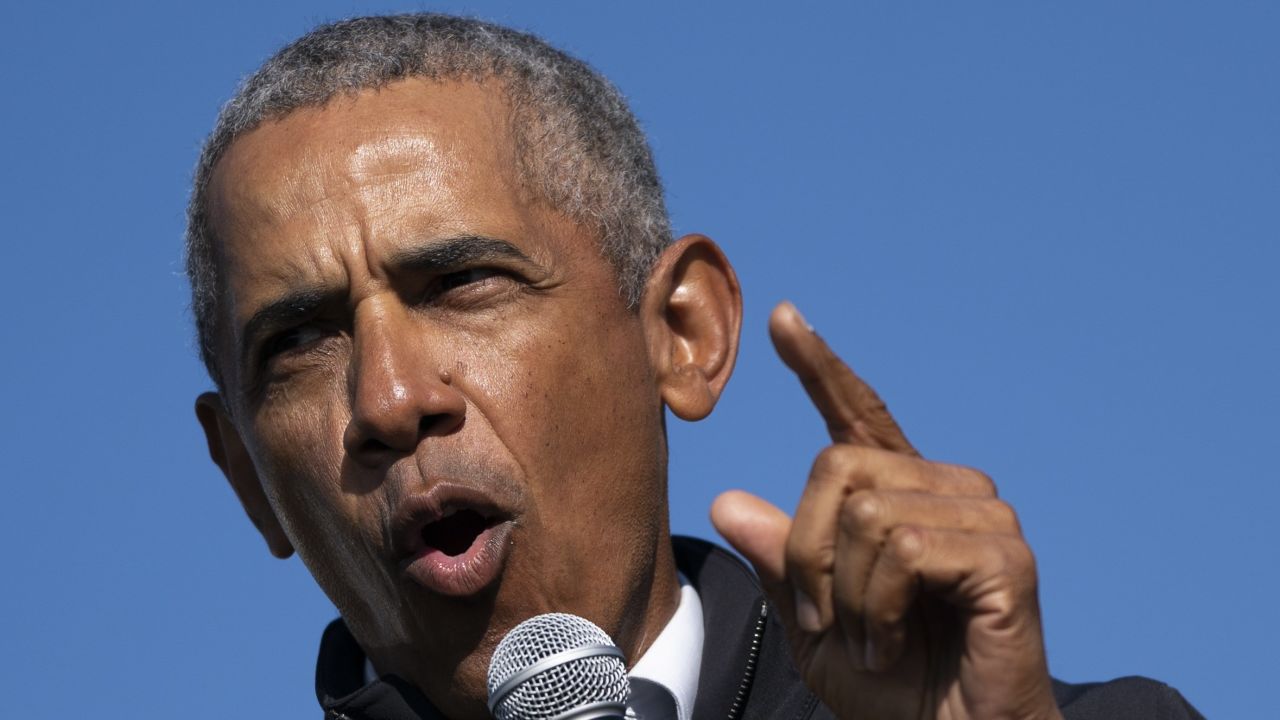 FLINT, MI - OCTOBER 31: Former U.S. President Barack Obama speaks during a drive-in campaign rally for Democratic presidential nominee Joe Biden at Northwestern High School on October 31, 2020 in Flint, Michigan. Biden is campaigning with former President Obama on Saturday in Michigan, a battleground state that President Donald Trump narrowly won in 2016. (Photo by Drew Angerer/Getty Images)