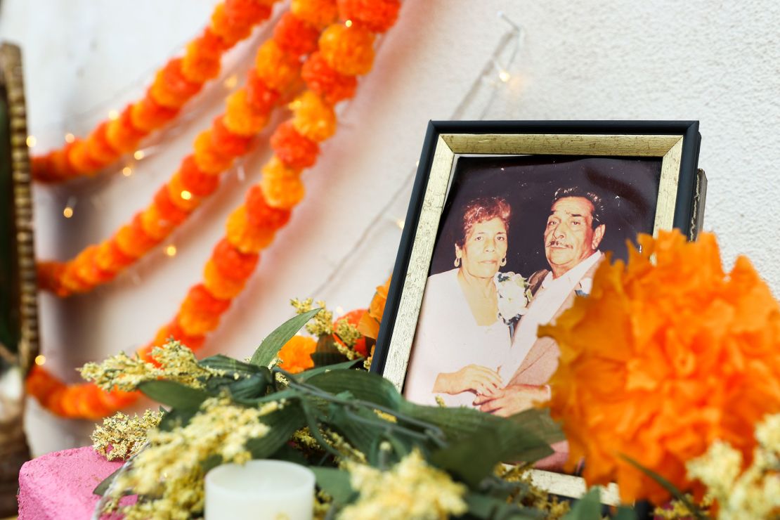 The ofrenda at Tres Leches Café has a photo of Magaly Saenz's partner's grandparents. The grandfather has passed away, but the grandmother is still alive. 