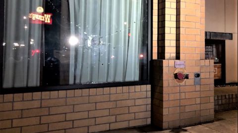 Windows were broken out of multiple businesses during marches in Portland, Oregon, on Saturday night, October 31, 2020.