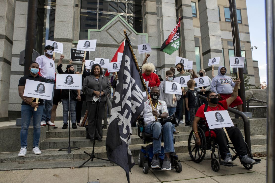 Melissa McFadden speaks to supporters in front of the Columbus Division of Police last month.