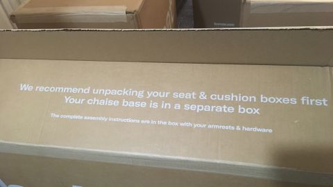One of the boxes for the Burrow couch