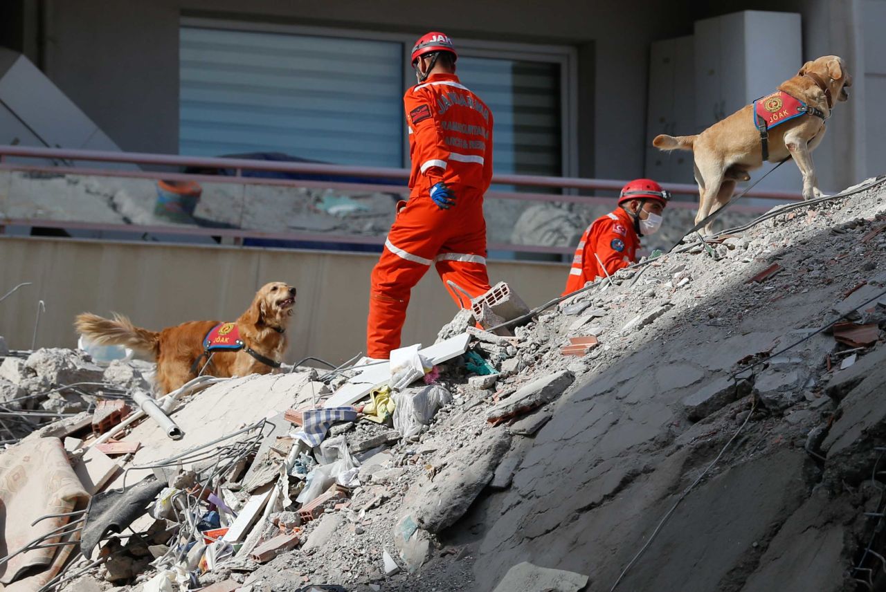 Rescuers search debris for survivors in Izmir.