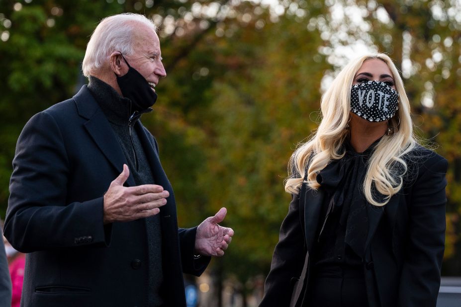 Biden talks with singer Lady Gaga before a drive-in rally in Pittsburgh on November 2.