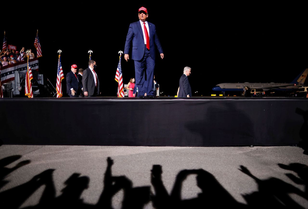 Trump arrives at an airport rally in Opa-Locka, Florida, on Monday, November 2.