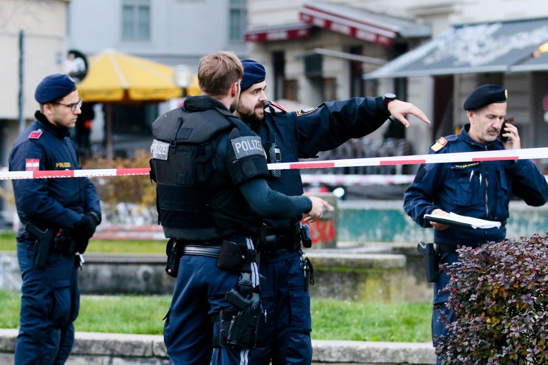 Armed police stay in position at the scene of the attack in the Austrian capital.