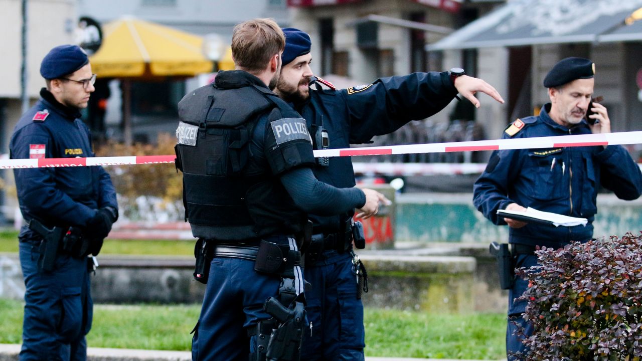 Armed police stay in position at the scene of the attack in the Austrian capital.