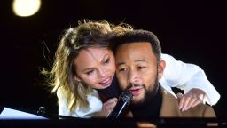 PHILADELPHIA, PA - NOVEMBER 02:   Singer John Legend is joined onstage by his wife, Chrissy Teigen, while performing before Democratic vice presidential nominee Sen. Kamala Harris (D-CA) speaks at a drive-in election eve rally on November 2, 2020 in Philadelphia, Pennsylvania. Democratic presidential nominee Joe Biden, who is originally from Scranton, Pennsylvania, remains ahead of President Donald Trump by about six points, according to a recent polling average.  With the election tomorrow, Trump held four rallies across Pennsylvania over the weekend, as he vies to recapture the Keystone State's vital 20 electoral votes. In 2016, he carried Pennsylvania by only 44,292 votes out of more than 6 million cast, less than a 1 percent differential, becoming the first Republican to claim victory here since 1988. (Photo by Mark Makela/Getty Images)