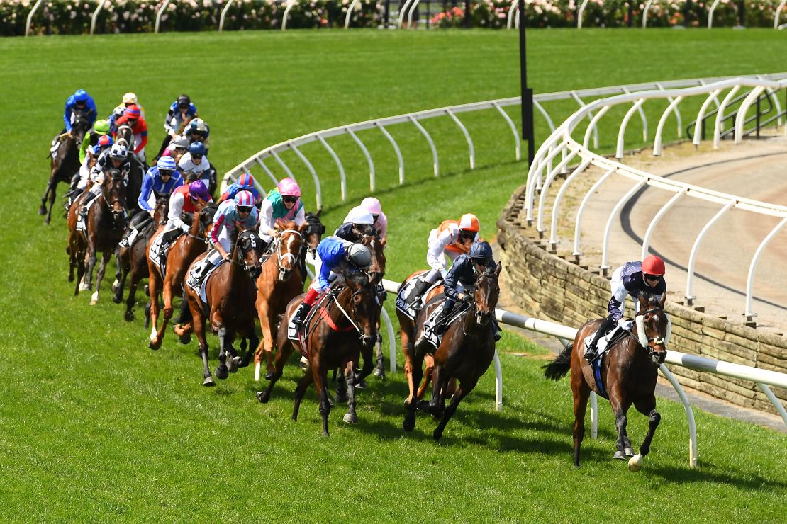 Twilight Payment leads the field around the first bend at the 2020 Melbourne Cup. 