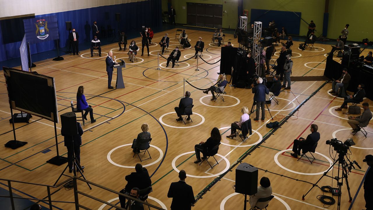 Guests and journalists sit in socially distanced circles as Democratic presidential nominee Joe Biden speaks at a campaign event in October.